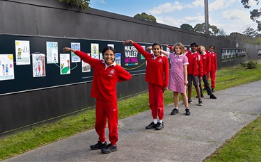 Students showing off the art trail